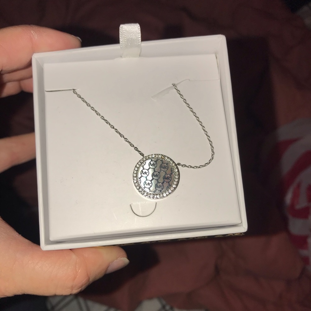 MK necklace it is short
